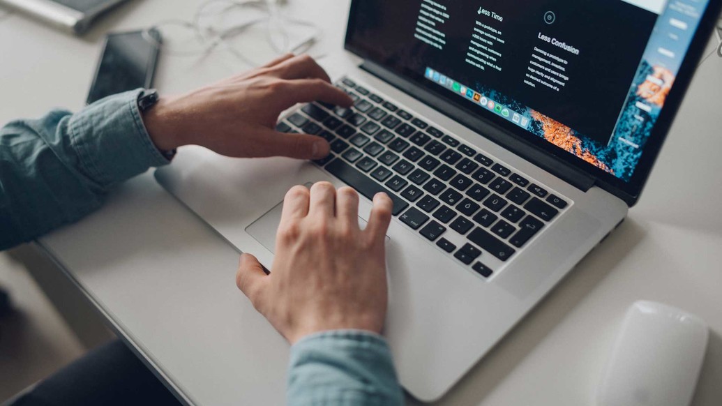 Man working on a laptop unsplash Man working on a laptop unsplash